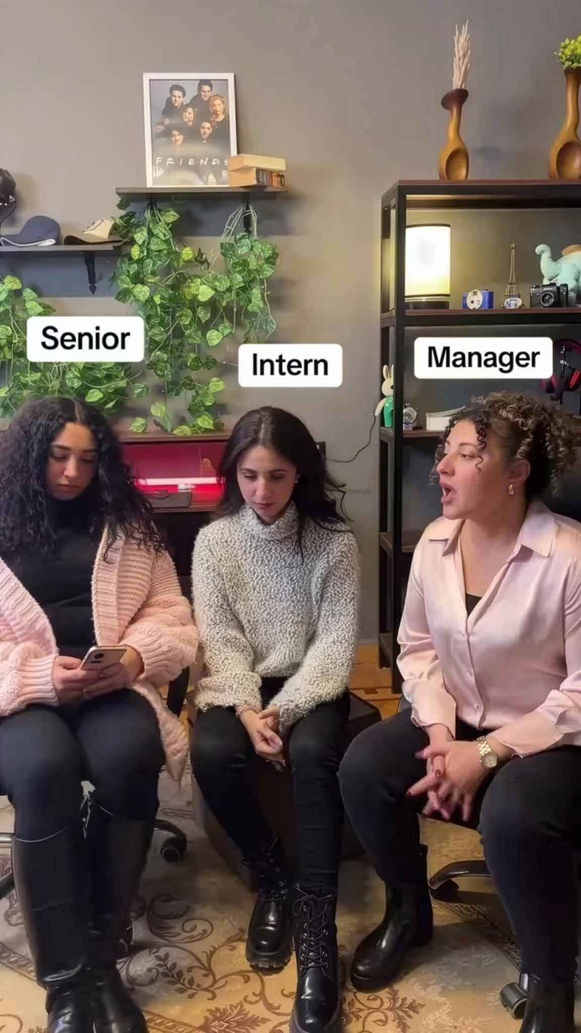 Optiiimum seniors, interns and managers reviewing work side by side